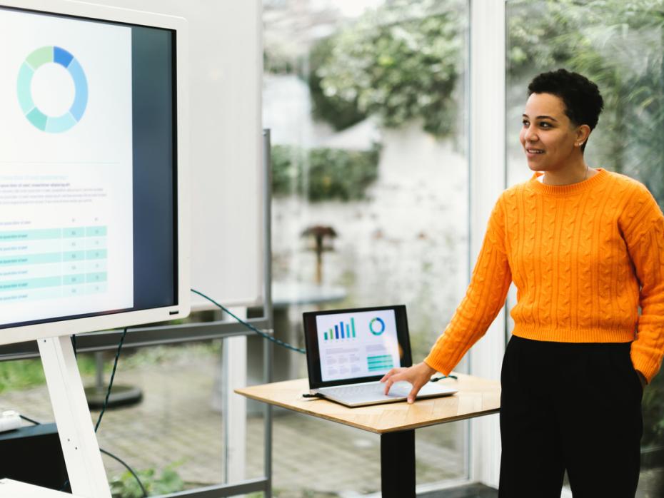 A teacher giving a PowerPoint presentation