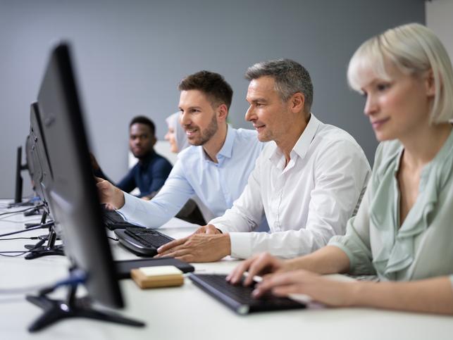 Managers work at their computers