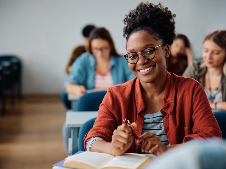 A student smiling to camera