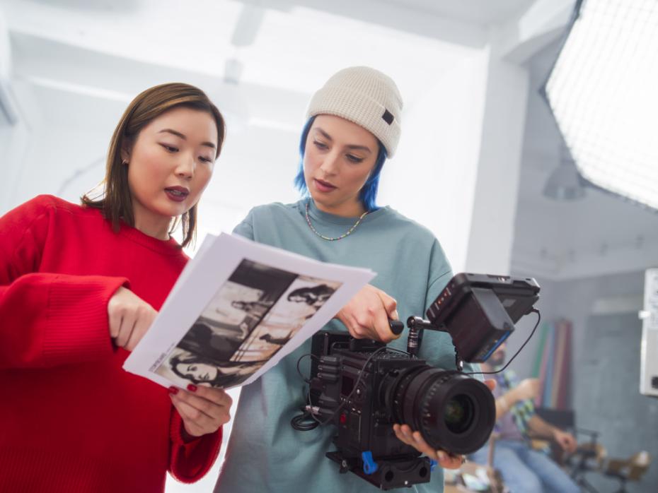 Two film students working on a project together