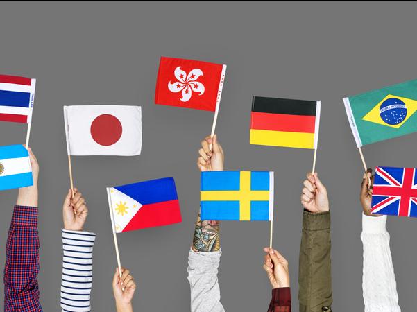 Arms wave international flags