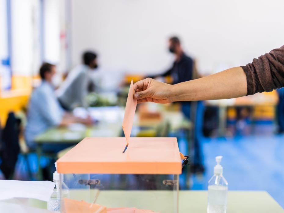 A voter casting their vote