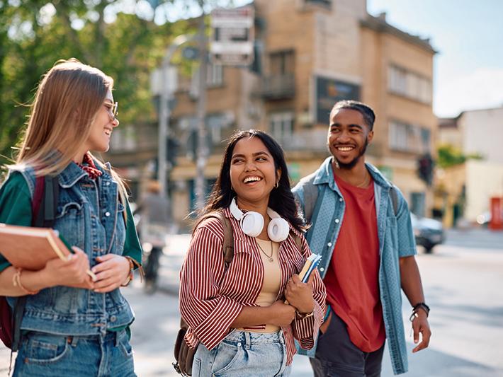 Multiracial group of three university students