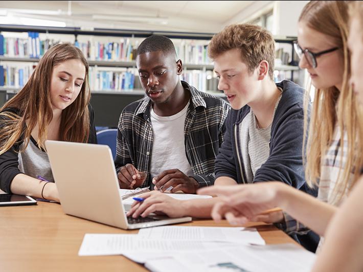 University students working on a group project