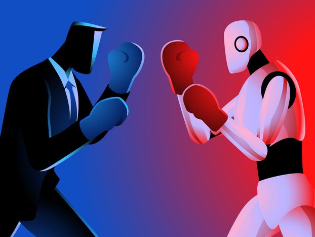 A suited man and a robot face off in boxing gloves