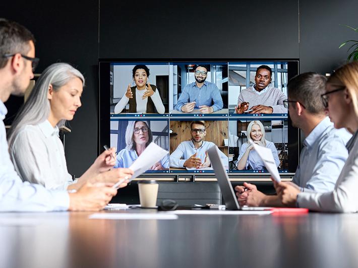Multicultural people in an online meeting