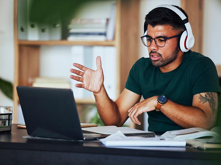 Black male student in academic meeting