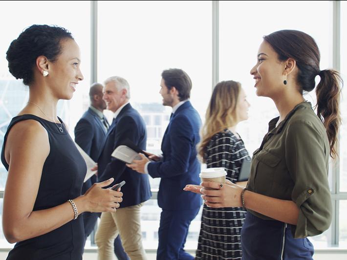 Businesswomen in conversation