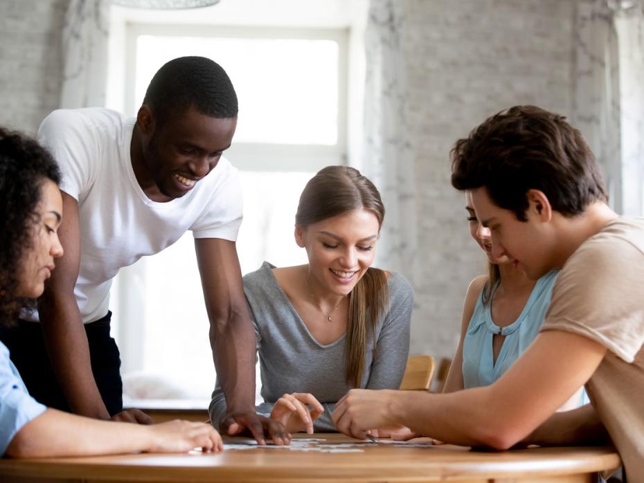 Students playing a table-top game