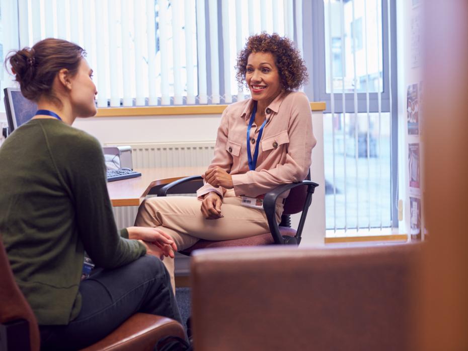 A supervisor and PhD student having a meeting