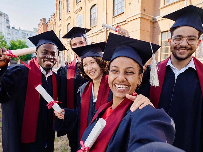 Multiracial group of university graduands