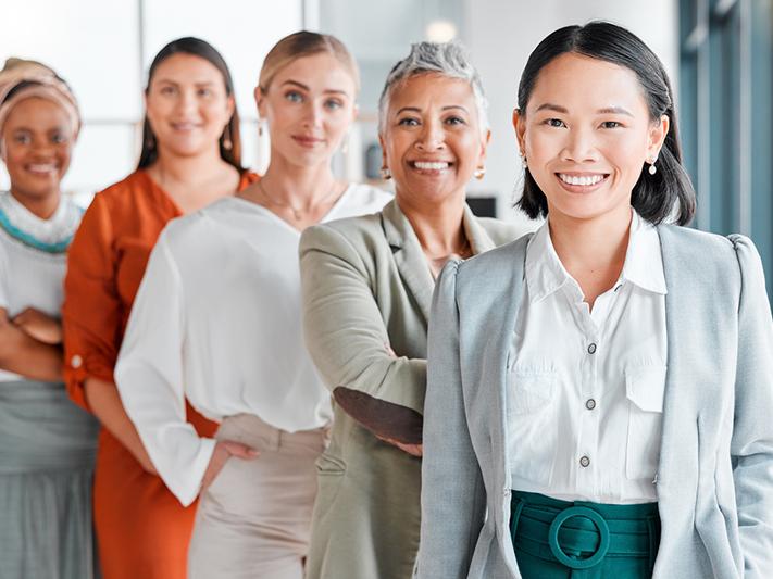 Multiracial group of women, women in university leadership concept