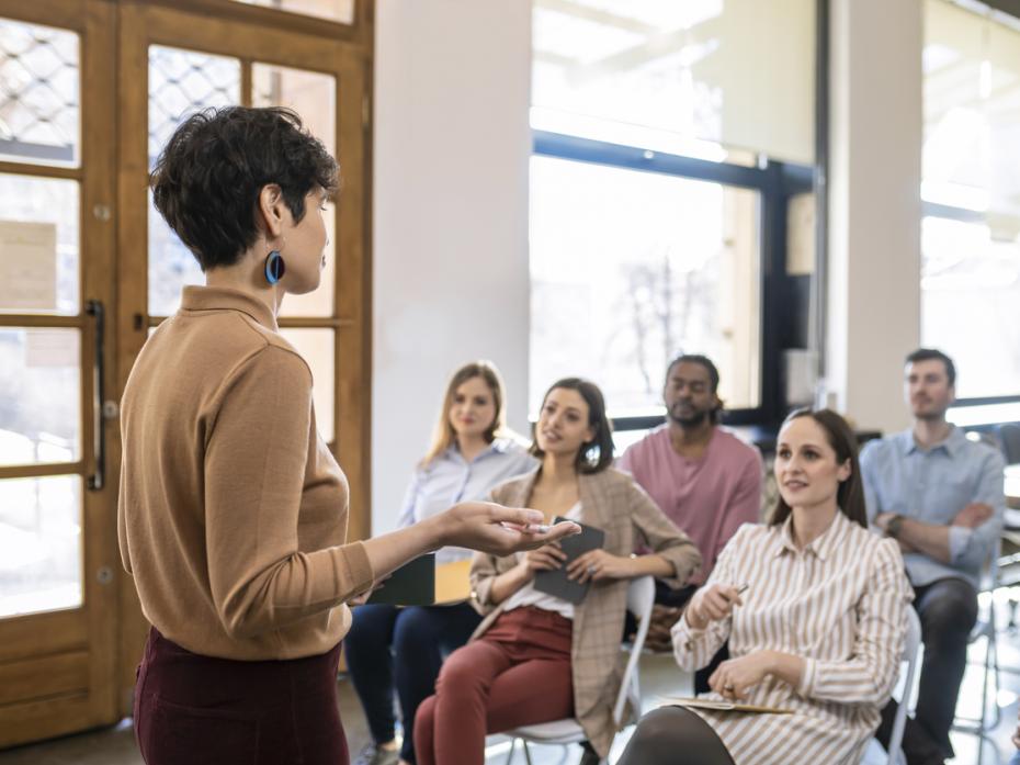 A female professor presenting to class