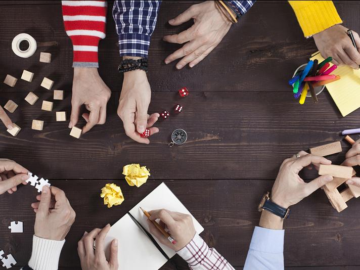 Details of hands playing different games