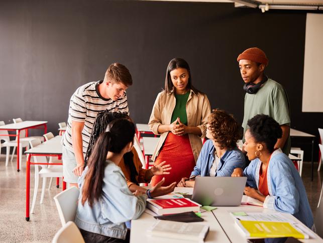 Students work together in a classroom