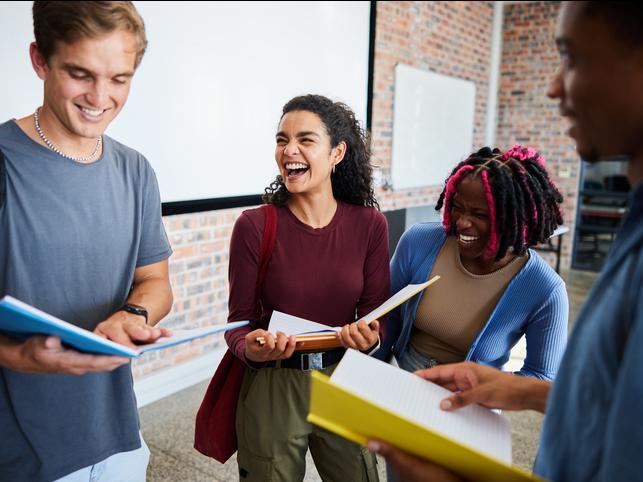 Students laugh together