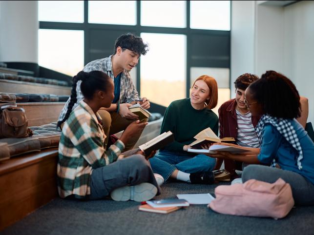 Students work together in a lecture hall