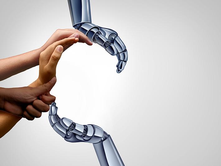 Human and robot hands making a curve shape
