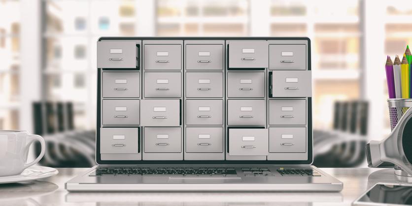 A laptop screen with many different storage drawers opening
