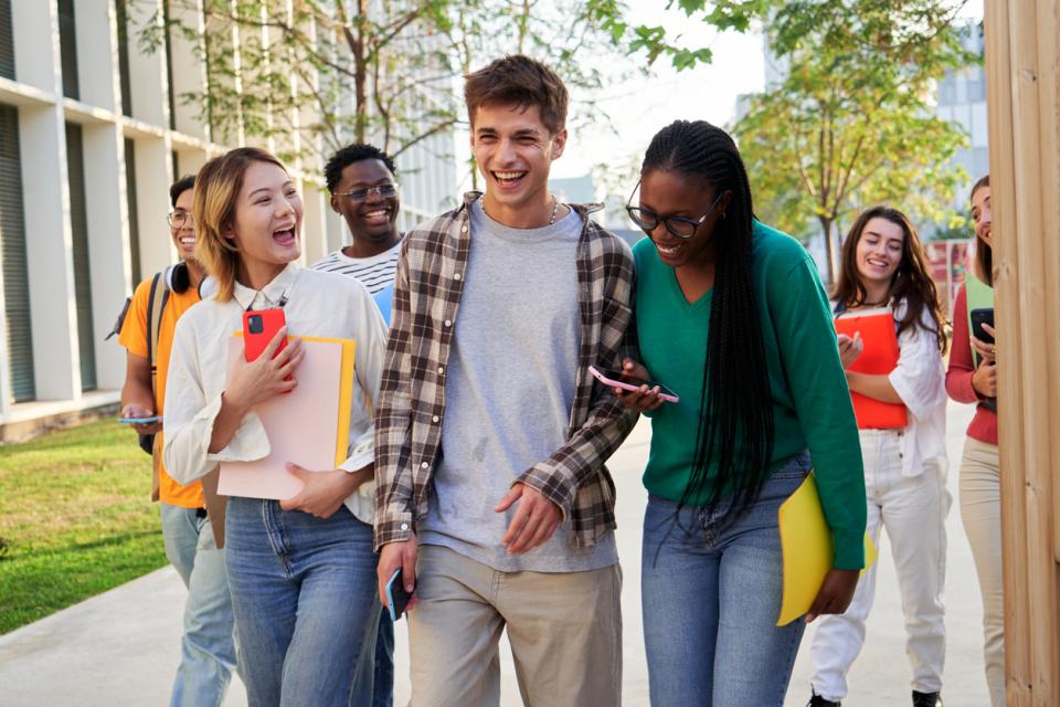 Students in a group walking together on campus