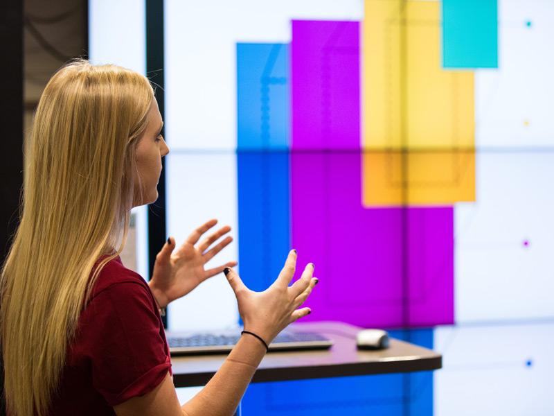 Woman teaching in bright room