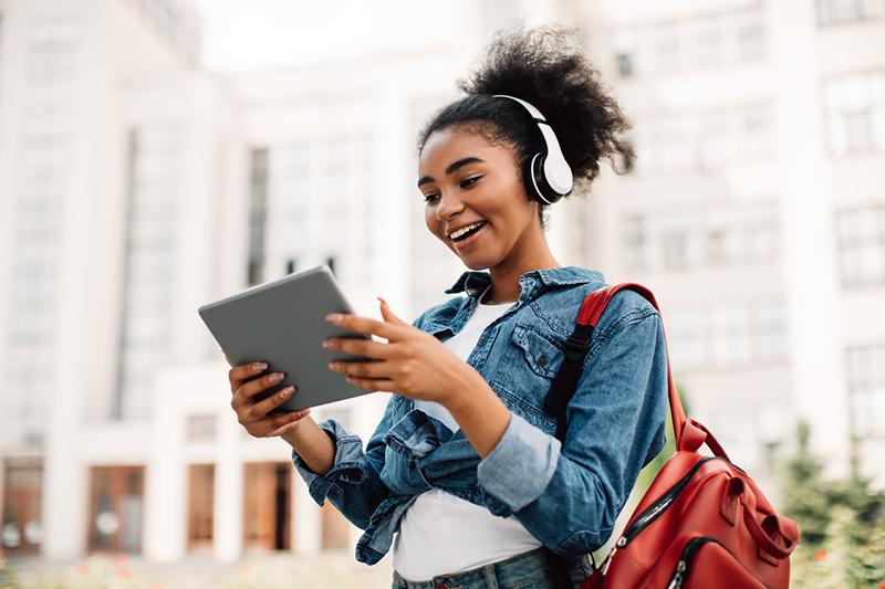 Black female student using tablet