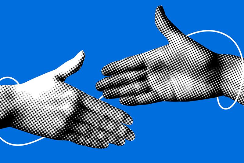 Pixelated hands shaking