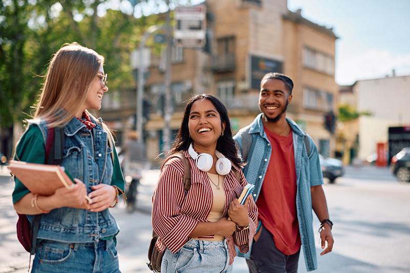 Multiracial group of three university students