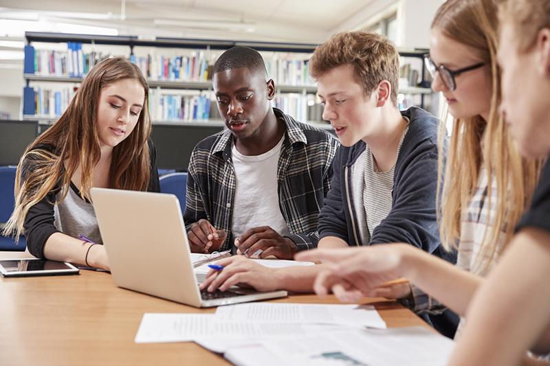 University students working on a group project