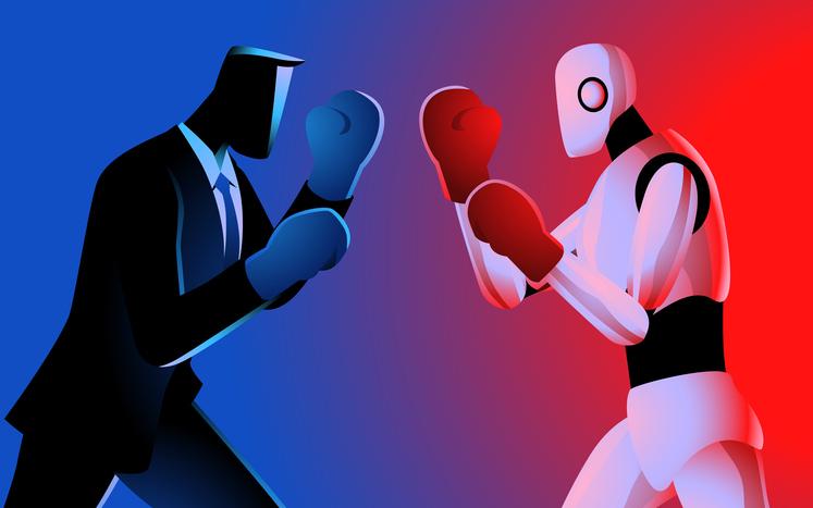 A suited man and a robot face off in boxing gloves