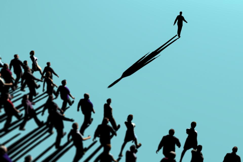 A group of people following someone