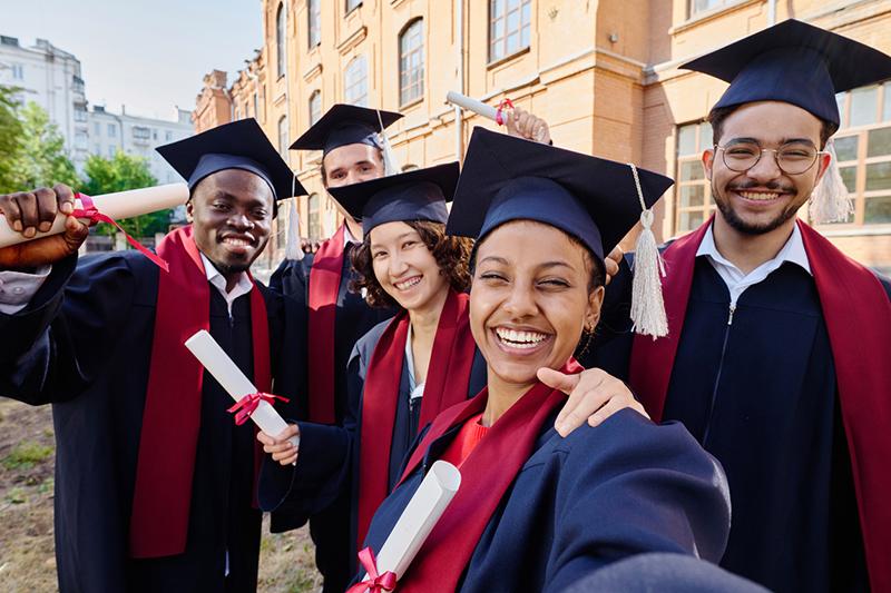 Multiracial group of university graduands