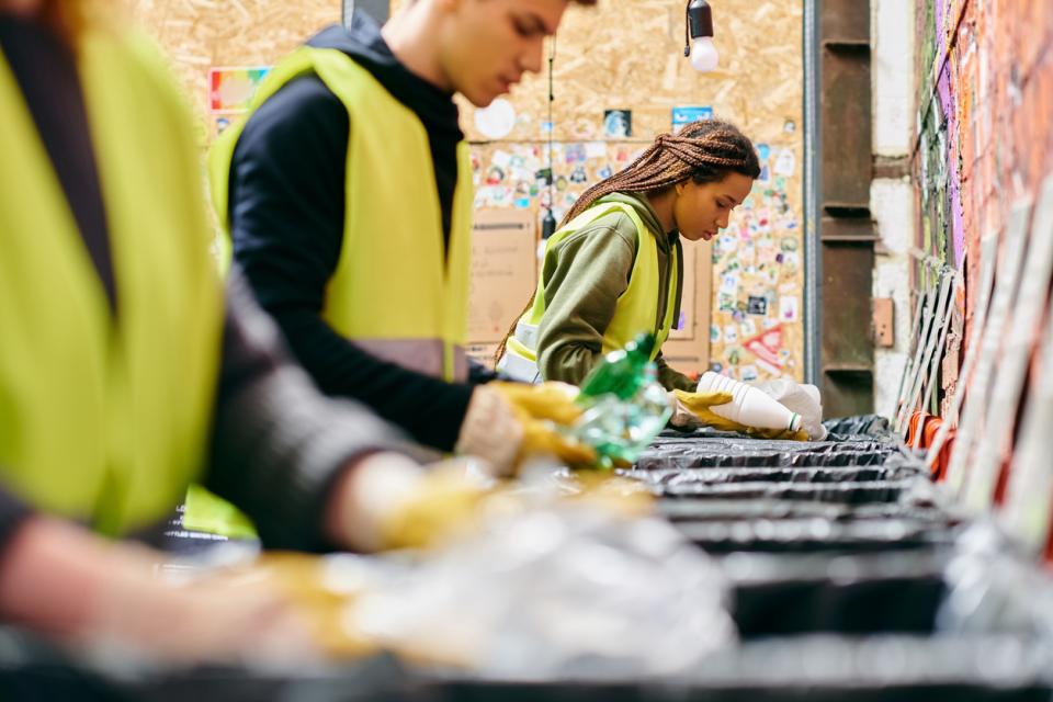 Students recycling at a local community centre