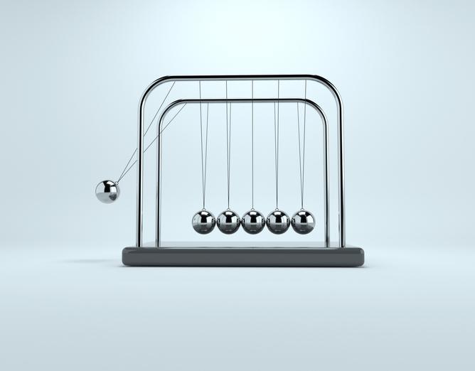 Newton's cradle on a white background