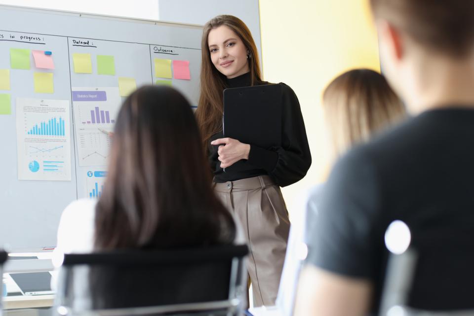 A student presenting in front of class