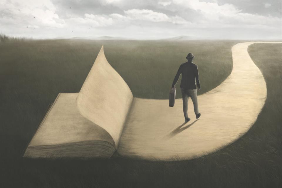A man embarks on a journey via a book 