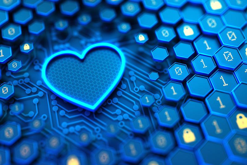Digital heart among locks, ones and zeros on keyboard