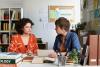 A teacher mentoring a student
