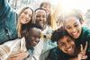 A happy group of students pose for a photo
