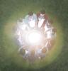 Students holding hands around a glowing orb