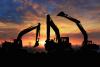 Bulldozers at sunset