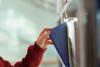 A library book being removed from a shelf