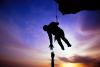 An abseiler catching a falling colleague