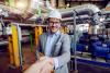 Man in hard hat shaking hands