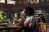 A young woman studies in a library