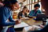 Students working together at a desk