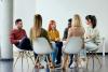A group of research participants sitting in a circle