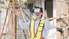 A construction student uses a VR headset