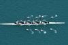 Male rowing team on water