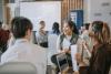 Students working in groups in class